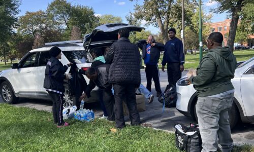 Allied Universal Employees Distribute Clothes and Food to Chicago Unsheltered